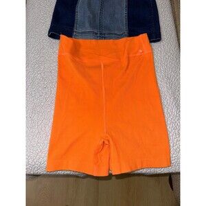 Free people movement orange shorts
